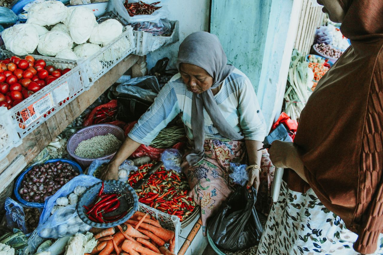 A vibrant display of vegetables at a local market in East Java.
